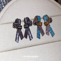 Crystal Bow Stud Earrings in Black or Multicolor Stripes view 3
