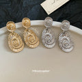 Textured Gold Tone Metal Spiral Oval Drop Stud Earrings view 2