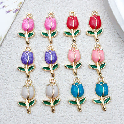 Colorful flower charms arranged on a light background