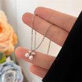 Silver-Tone Cherry Pendant Necklace with Pearl Beads and Leaves view 1