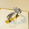 Silver-Tone Feather Band Ring with a Marquise Clear Stone view 2