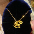 Gold Tone Rocking Horse Necklace and Matching Stud Earrings view 6