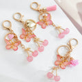 Pink Butterfly Cherry Charm Keychain with Gold Hardware view 1