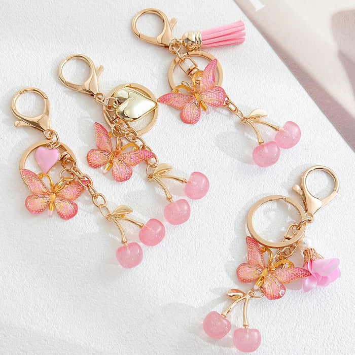 Pink Butterfly Cherry Charm Keychain with Gold Hardware