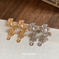 Silver Tone Floral Crystal Drop Stud Earrings With Decorative Metal Accents view 2