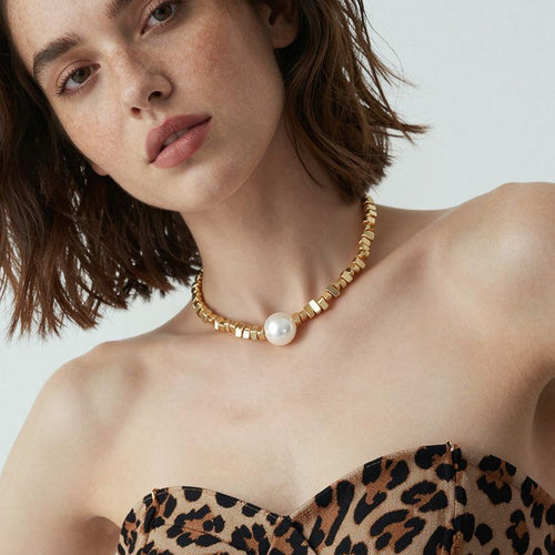 Neckline view of irregular mineral and imitation pearl necklaces in main image 2.