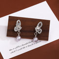 Silver Rhinestone Butterfly Stud Earrings Gray Pearl Drops view 1