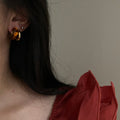 Amber Brown Resin Hoop Earrings With Gold Tone Frames view 2