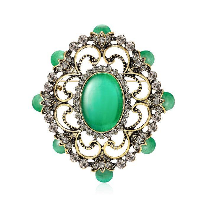 Baroque Oval Cabochon Brooch in Green or Pale Blue Crystal