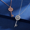 Ornate Key Pendant Necklace in Two Metal Tones With Polished Clear Stone Detail view 2