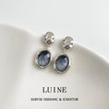 Silver Tone Openwork Top And Blue Gray Round Stone Stud Earrings view 3