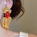 Red Resin Heart Statement Earrings with Gold Tone Wings view 3