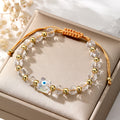 Faceted Clear Bead and Gold Tone Evil Eye Cord Bracelets view 7