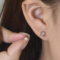 Rose Gold Swirl Frame Clear Center Stone Stud Earrings view 3