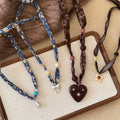 Floral Ribbon Necklace With Beads and Playful Pendants view 2