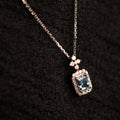 Silver Tone Aqua Emerald Cut Halo Pendant Necklace view 3