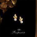 Matte Gold Maple Leaf Pearl Stud Earrings White Accent view 1