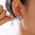 Bow Pearl Drop Stud Earrings with Rhinestone Center Gold Steel view 3