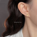 Gold Mini Triangle Stud Earrings Radial Cut Facets view 2