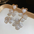 Heart and Petal Cascade Drop Earrings in Ivory with Polished Details view 6
