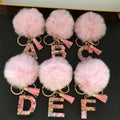 Pink Faux Fur Pompom Letter Charm Keychain with Confetti Resin view 1