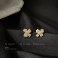 Mini Gold Tone Pave Clear Stone Flower Stud Earrings view 2