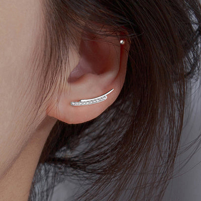 Silver Tone double curve ear climbers shown in front detail view
