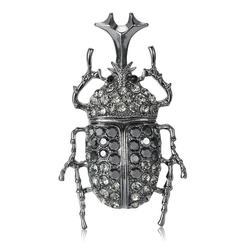 Crystal Beetle brooch In Black And Antique Gold Decorative Lapel Pin shown in front view on a light background