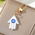 Gold Tone Colorful Hamsa Evil Eye Clip Keychains in Nine Colors view 3