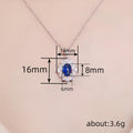 Silver Tone Blue Oval Cabochon Floral Halo Pendant Necklace view 4