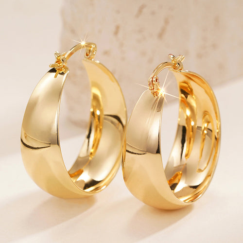 Smooth broad polished gold-tone hoop earrings