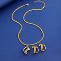Gold Tone Gold Infinity Loop Geometric Metal Necklace and Earring Set view 3