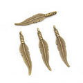 Slender Feather Charms in Four Mixed Metal Options view 6