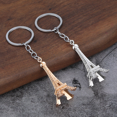 Gold-tone and silver-tone Eiffel Tower keychains
