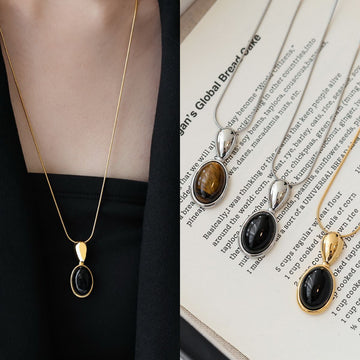 Oval Black Cabochon Pendant Necklace in Gold and Silver Tones