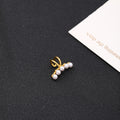 Gold Tone Bow and Pearl Look Beaded Curved Ear Cuff Earring view 6