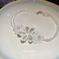 White Beaded Flower Collar Necklace With Polished Metal Tone Details view 4