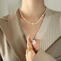 White Irregular Pearl Necklace With Gold Heart Spacers view 4
