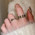 Two Silver Tone Green Link And Oval Crystal Open Ring Designs view 3