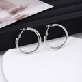 Gold and Silver Double Crossover Large Hoop Earrings view 3