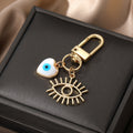 Gold Tone White Shell Evil Eye Charm Clip Keychains in Six Shapes view 2