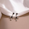 Black Stone Silver Tone Ornate Cross Long Earrings view 2