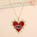 Gold Tone Pearl-Edged Heart Evil Eye Pendant Necklaces in Five Colors view 6