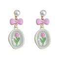 Pearl Pink Bow Tulip Charm Drop Earrings Cream Oval Plaque view 5