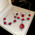 Silver Tone Red Oval Crystal Necklace And Ring With Clear Halos view 2
