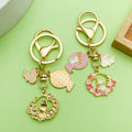 Easter Bunny Charm Keychains Featuring Pink Flower Across 19 Pictured Variations view 2