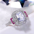 Square White Stone Ring with Pink Side Stones and Pavé Halo view 3