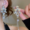 Floral Crystal Drop Earrings In Silver And Gold Tones view 3