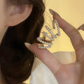 White Pearl Multi Row Ear Cuff Clip Earrings With Curved Profile view 3