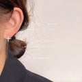 Gold Tone Clear Stone Four Point Starburst Stud Earrings view 2